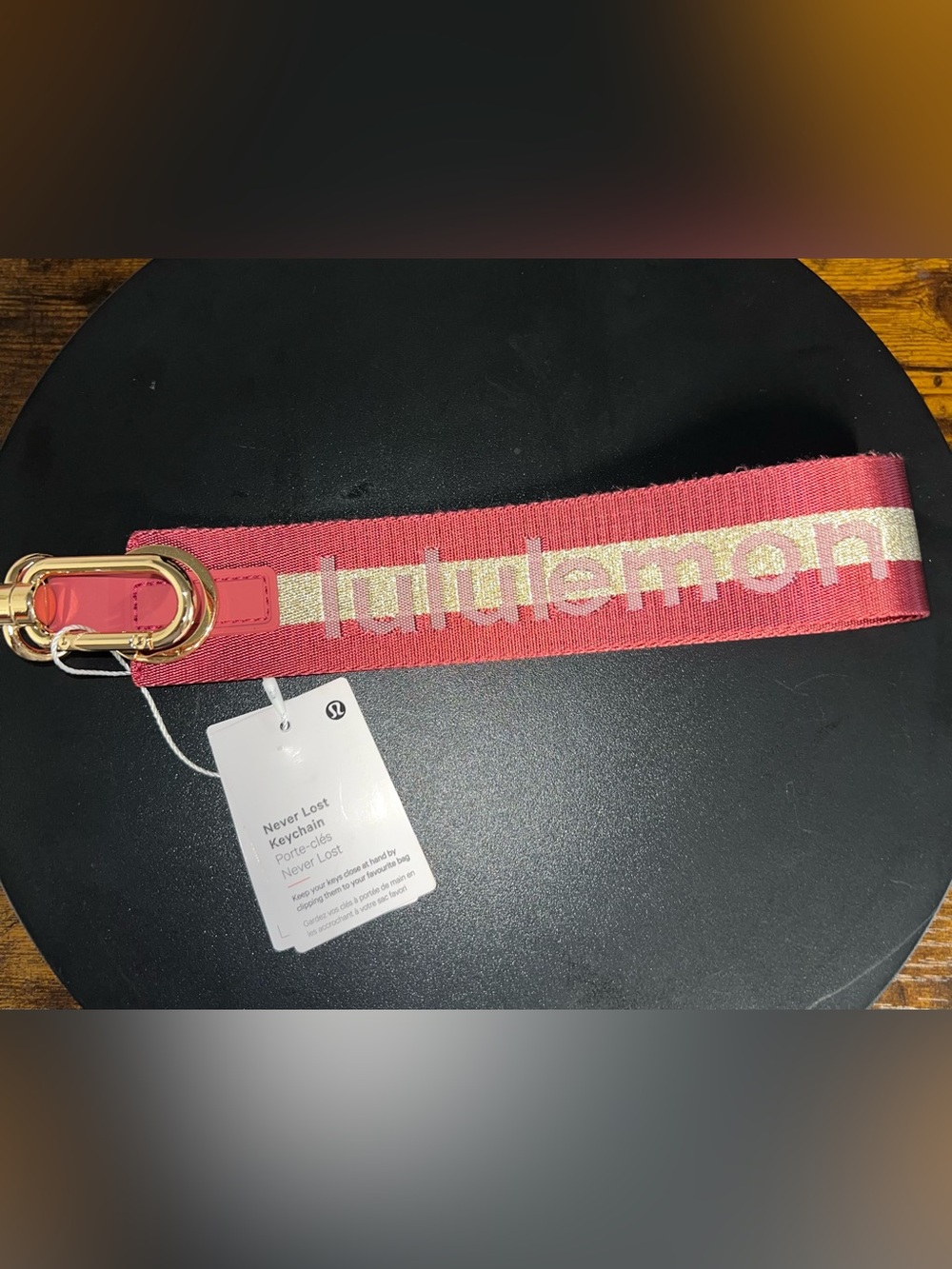 lululemon athletica Never Lost Keychain Strap in Coral with Gold Accent